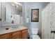 Charming bathroom with blue walls, a white sink, and a framed mirror at 5120 Parkwood Oaks Ln, Smyrna, GA 30126