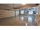 Spacious two-car garage with epoxy flooring, ample storage, and a bicycle rack for convenient organization at 5120 Parkwood Oaks Ln, Smyrna, GA 30126