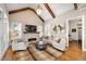 Comfortable living room with a stone fireplace, high ceilings, and lots of natural light at 5120 Parkwood Oaks Ln, Smyrna, GA 30126