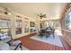 Enclosed patio with outdoor dining and lounging offering a relaxed area with windows and screens at 5120 Parkwood Oaks Ln, Smyrna, GA 30126