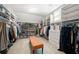 Spacious walk-in closet with custom shelving and storage for clothing, shoes, and accessories at 5120 Parkwood Oaks Ln, Smyrna, GA 30126