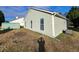 The home's backyard features a shed, grass, and the home's exterior at 5778 Eagles Feather Ln, Riverdale, GA 30274
