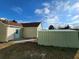 Backyard with a shed, patio, and a well-maintained lawn at 5778 Eagles Feather Ln, Riverdale, GA 30274