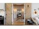 Elegant entryway with decor, rustic doors, and decorative lighting at 7455 Old Rico Rd, Chattahoochee Hills, GA 30268