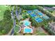Aerial shot of community amenities, including pool, tennis courts, and clubhouse at 3305 Suffolk Dr, Cumming, GA 30041