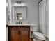 Updated bathroom with a framed mirror, vanity, and shower/tub combo at 3305 Suffolk Dr, Cumming, GA 30041