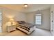 Bright bedroom features a window with view and neutral decor at 3305 Suffolk Dr, Cumming, GA 30041