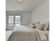 Bright bedroom featuring neutral decor and natural light at 3305 Suffolk Dr, Cumming, GA 30041