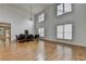 Elegant dining room with hardwood floors, a modern chandelier, and ample natural light at 3305 Suffolk Dr, Cumming, GA 30041