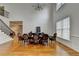Stately dining room featuring hardwood floors, modern light fixture, and natural light at 3305 Suffolk Dr, Cumming, GA 30041