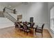 Elegant dining room features hardwood floors, soaring ceilings and a modern dining set at 3305 Suffolk Dr, Cumming, GA 30041