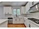 Modern kitchen featuring quartz countertops and stainless steel appliances at 3305 Suffolk Dr, Cumming, GA 30041