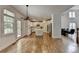 Open concept kitchen with a center island, stainless appliances, and bright windows at 3305 Suffolk Dr, Cumming, GA 30041
