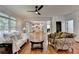 Spacious living room with hardwood floors offering an open concept layout into the kitchen at 3305 Suffolk Dr, Cumming, GA 30041