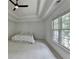 Spacious main bedroom with tray ceilings, fan, and large windows at 3305 Suffolk Dr, Cumming, GA 30041