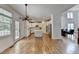 Bright open floor plan featuring white walls and hardwood floors at 3305 Suffolk Dr, Cumming, GA 30041