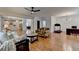 Open concept floorplan showing living room into dining area and kitchen beyond at 3305 Suffolk Dr, Cumming, GA 30041