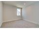 Bedroom featuring neutral carpet, natural light, and simple clean design at 3941 Adler Cir, Buford, GA 30519