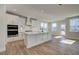 Bright and airy kitchen features a large island, white cabinets, and stainless appliances at 3941 Adler Cir, Buford, GA 30519