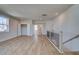 Bright loft space with plank flooring and staircase that offers versatile living options at 3941 Adler Cir, Buford, GA 30519