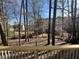 A beautiful backyard view from a wooden deck, highlighting the natural landscape at 3954 Lullwater Main Nw, Kennesaw, GA 30144