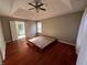 Primary bedroom with high ceilings and a glimpse into the Primary bathroom at 3954 Lullwater Main Nw, Kennesaw, GA 30144