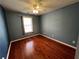 Bedroom with hardwood floors and lots of natural light at 3954 Lullwater Main Nw, Kennesaw, GA 30144