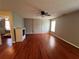 Spacious bonus room featuring hardwood floors and modern ceiling fan at 3954 Lullwater Main Nw, Kennesaw, GA 30144