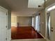 The foyer leads into a room with hardwood floors and wainscotting detail at 3954 Lullwater Main Nw, Kennesaw, GA 30144