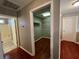 Hallway leading to bathroom, laundry, and bedroom at 3954 Lullwater Main Nw, Kennesaw, GA 30144