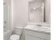 Well-lit bathroom with a white vanity, marble countertop, and shower-tub combo at 440 Reflection Dr # 16, Stockbridge, GA 30281