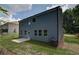 Exterior shot of the home's rear showing the back patio and newly seeded lawn at 4524 Ajo Walk, Atlanta, GA 30331