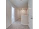 Hallway with carpet and a white door at 4524 Ajo Walk, Atlanta, GA 30331