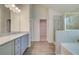 Beautiful bathroom featuring double vanity, granite countertop, and tile flooring at 4524 Ajo Walk, Atlanta, GA 30331