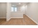 Upstairs hallway with luxury vinyl plank flooring at 4671 Larkfield Way, Powder Springs, GA 30127