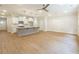 Spacious living area featuring luxury vinyl plank flooring and natural light at 4671 Larkfield Way, Powder Springs, GA 30127