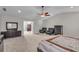Bedroom showcasing neutral colors, carpet, and an arched ceiling at 1531 Autumn Wood Trl, Buford, GA 30518