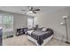 Bedroom features carpet, neutral walls and 2 windows at 1531 Autumn Wood Trl, Buford, GA 30518