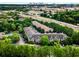 Aerial view of a community complex, landscaping, and highway off in the distance at 2700 Pine Tree Ne Rd # 1117, Atlanta, GA 30324