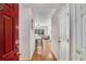 Warm foyer leading to a cozy living space with hardwood floors and a view of the well-lit interior at 2700 Pine Tree Ne Rd # 1117, Atlanta, GA 30324
