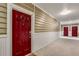 Inviting hallway entrance with brightly painted doors, clean floors, and neutral wall colors at 2700 Pine Tree Ne Rd # 1117, Atlanta, GA 30324