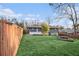 Spacious backyard featuring a lush lawn, privacy fence, and a well-maintained exterior at 3388 Hyland Dr, Decatur, GA 30032