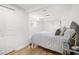 Bright bedroom featuring a plush bed, light wood floors, and recessed lighting at 3388 Hyland Dr, Decatur, GA 30032