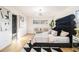 Stylish bedroom featuring hardwood floors, modern furniture, and windows with natural light at 3388 Hyland Dr, Decatur, GA 30032