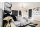 Modern bedroom featuring a statement headboard, black and white decor, and hardwood floors at 3388 Hyland Dr, Decatur, GA 30032