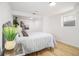 Bright bedroom with a large bed, light wood floors, and neutral decor at 3388 Hyland Dr, Decatur, GA 30032
