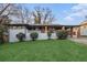 Charming single-story home with a well-manicured lawn and inviting facade at 3388 Hyland Dr, Decatur, GA 30032