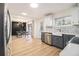 Well-lit kitchen featuring stainless steel appliances and dining area at 3388 Hyland Dr, Decatur, GA 30032