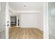Bright living room with wood-look flooring and open layout at 3388 Hyland Dr, Decatur, GA 30032