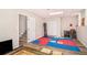 Finished basement offers a workout area and ample storage space for recreation and fitness at 6739 Valley Ct, Douglasville, GA 30135